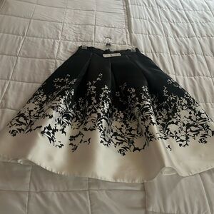 White and Black Skirt Floral design Satin Material size 0 with tags